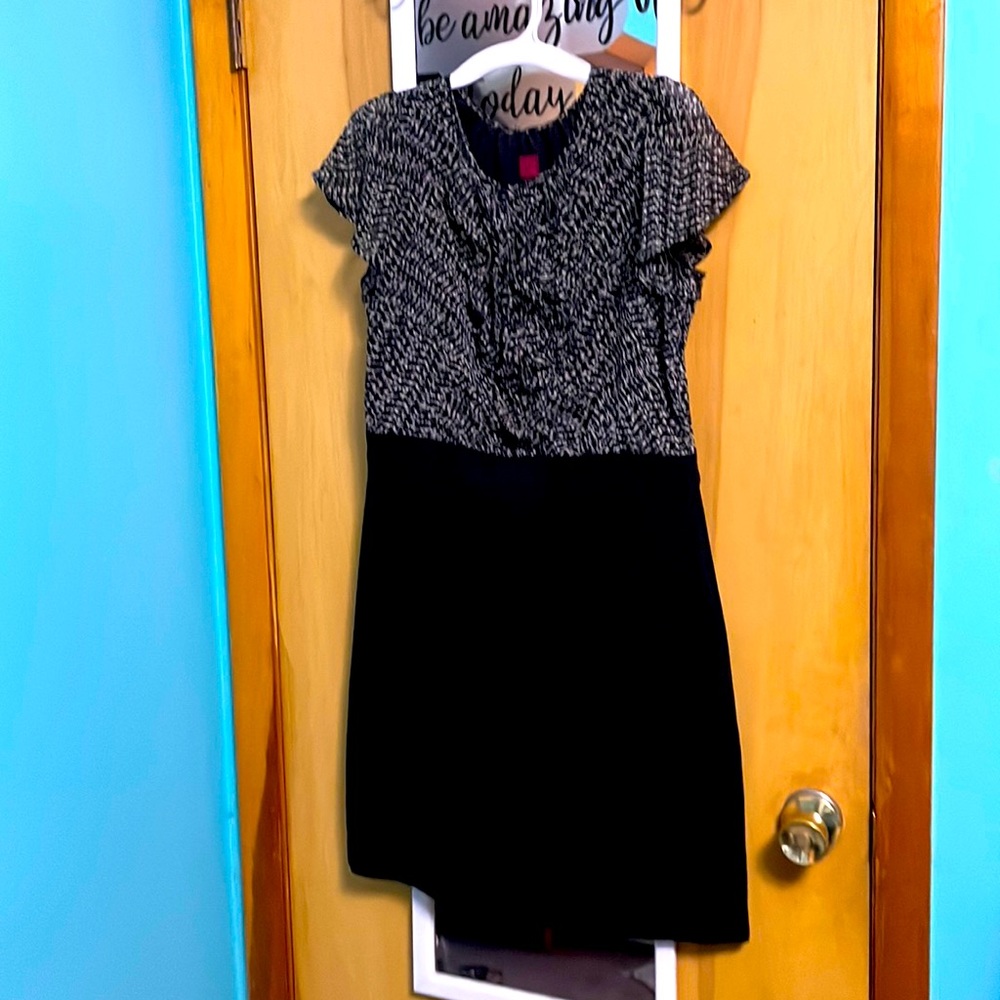 Black and white blouse and skirt looking dress.